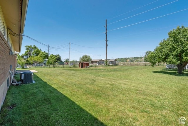 1460 Canyon Dr, South Weber, UT 84405 - view of grassy yard with central AC unit