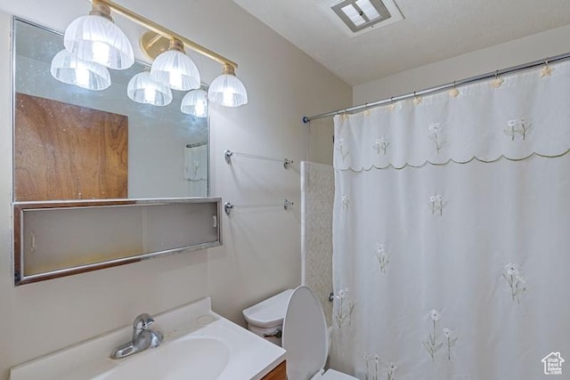 1460 Canyon Dr, South Weber, UT 84405 - bathroom with toilet, vanity, and a shower with curtain