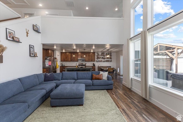 325 W 3170 S, Nibley, UT 84321 - living room featuring a towering ceiling, dark wood-style flooring, and recessed lighting