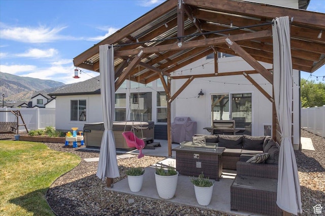 325 W 3170 S, Nibley, UT 84321 - view of patio / terrace featuring a hot tub, an outdoor living space, a mountain view, a grill, and a gazebo