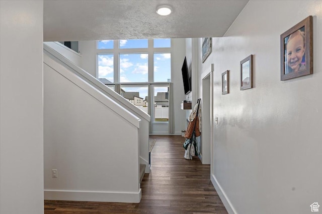 325 W 3170 S, Nibley, UT 84321 - hall featuring baseboards, dark wood-style flooring, and stairs