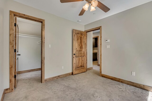 1675 S Beaver Bench Rd E Unit 1417, Heber City, UT 84032 - unfurnished bedroom featuring baseboards, a closet, concrete flooring, and a ceiling fan