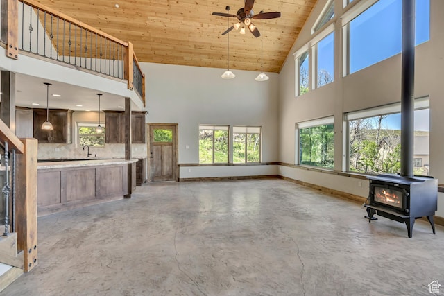 1675 S Beaver Bench Rd E Unit 1417, Heber City, UT 84032 - unfurnished living room with high vaulted ceiling, wood ceiling, a ceiling fan, healthy amount of natural light, and finished concrete flooring