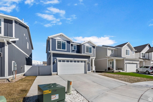432 N Commodore Ln, Saratoga Springs, UT 84045 - view of front of home featuring an attached garage, driveway, and a residential view