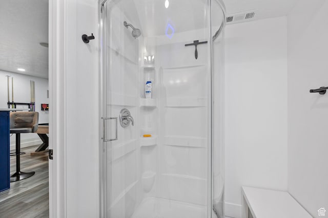 432 N Commodore Ln, Saratoga Springs, UT 84045 - full bathroom with a stall shower, wood finished floors, and baseboards