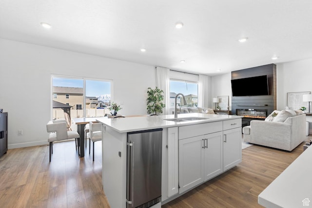 432 N Commodore Ln, Saratoga Springs, UT 84045 - kitchen with a sink, light wood-style floors, open floor plan, plenty of natural light, and recessed lighting