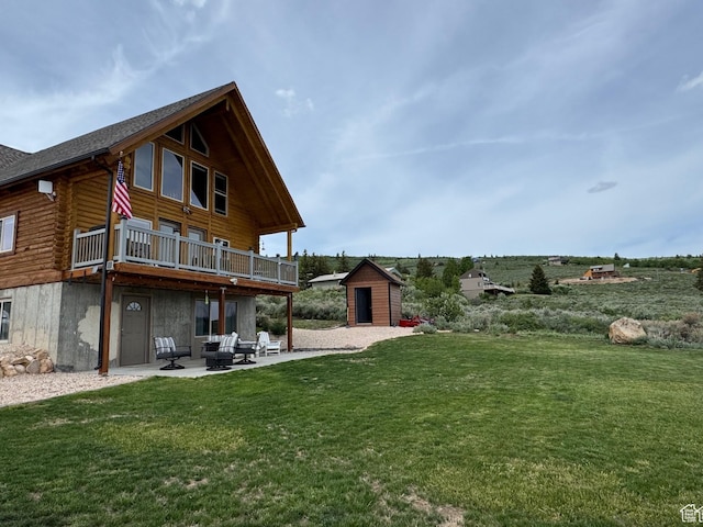 3500 S Sweetwater Pkwy Unit 4, Garden City, UT 84028 - view of grassy yard featuring a patio and a wooden deck