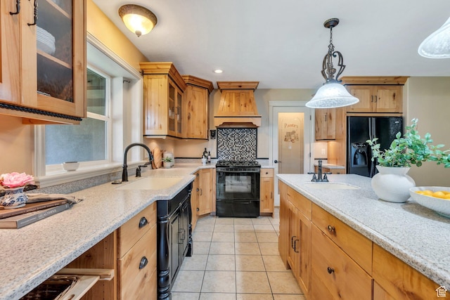 386 W 250 S, Lindon, UT 84042 - kitchen featuring black appliances, a sink, premium range hood, hanging light fixtures, and glass insert cabinets