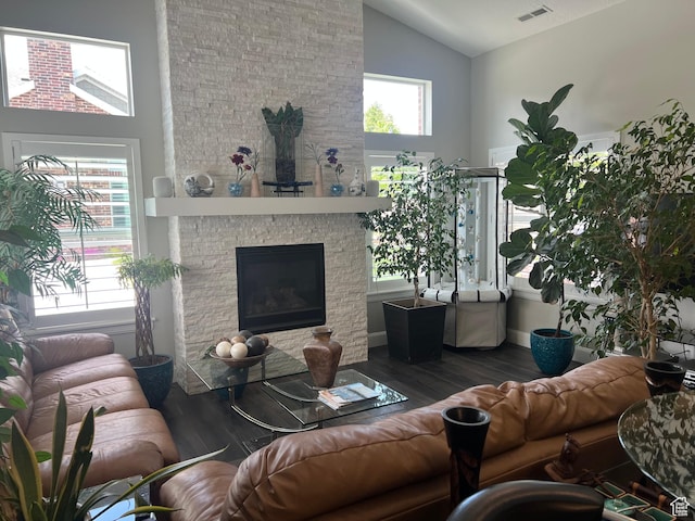 3256 W Harvest Chase Dr, South Jordan, UT 84095 - living area with high vaulted ceiling, a stone fireplace, and wood finished floors