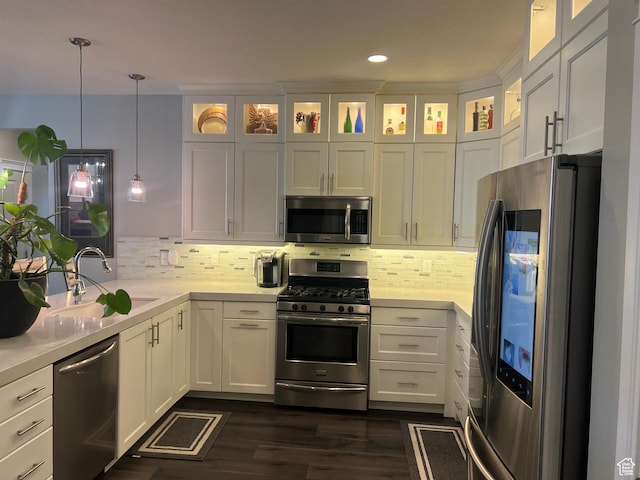 3256 W Harvest Chase Dr, South Jordan, UT 84095 - kitchen featuring appliances with stainless steel finishes, a sink, light countertops, white cabinets, and recessed lighting