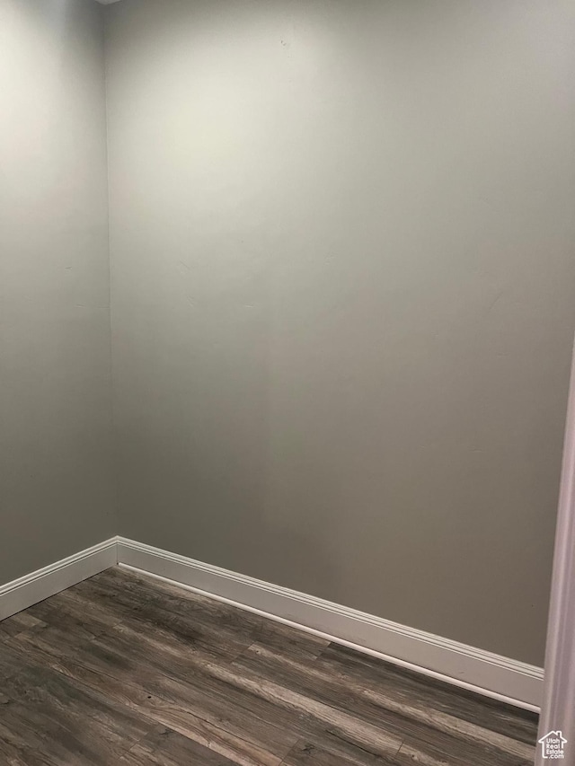 3256 W Harvest Chase Dr, South Jordan, UT 84095 - unfurnished room featuring baseboards and dark wood-type flooring