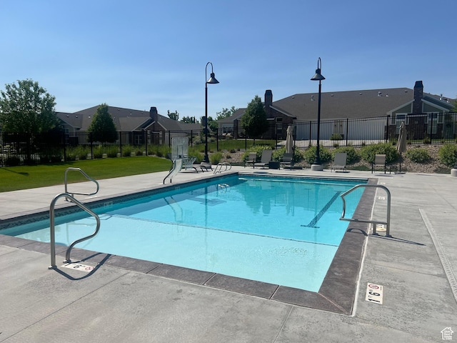 3256 W Harvest Chase Dr, South Jordan, UT 84095 - community pool with a residential view and a patio area