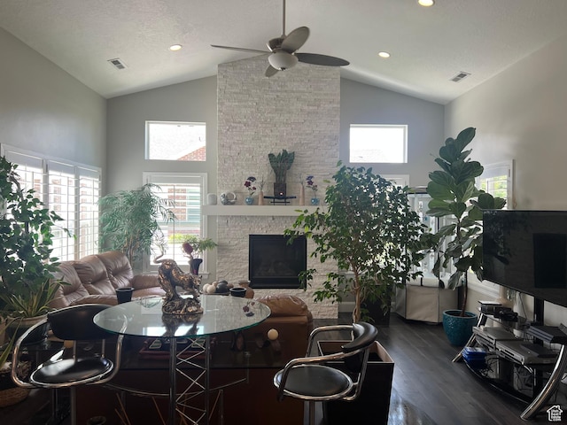 3256 W Harvest Chase Dr, South Jordan, UT 84095 - living area with ceiling fan, a large fireplace, dark wood-style floors, high vaulted ceiling, and plenty of natural light
