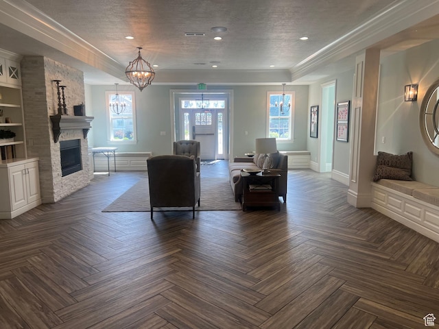 3256 W Harvest Chase Dr, South Jordan, UT 84095 - living room with a chandelier, a fireplace, baseboards, a textured ceiling, and recessed lighting