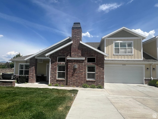 3256 W Harvest Chase Dr, South Jordan, UT 84095 - view of front of house with board and batten siding, driveway, a garage, a chimney, and a front yard