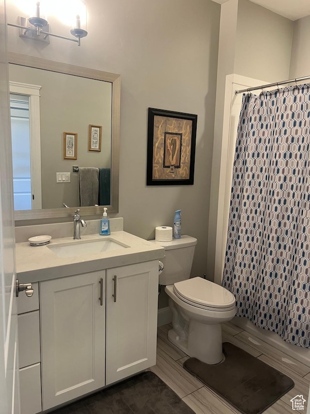 3256 W Harvest Chase Dr, South Jordan, UT 84095 - full bath featuring toilet, vanity, a shower with shower curtain, and tile patterned floors