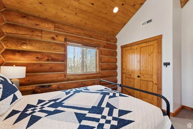 1085 Moose Hollow Rd, Robertson, WY 82944 - bedroom featuring vaulted ceiling, rustic walls, wooden ceiling, baseboards, and carpet