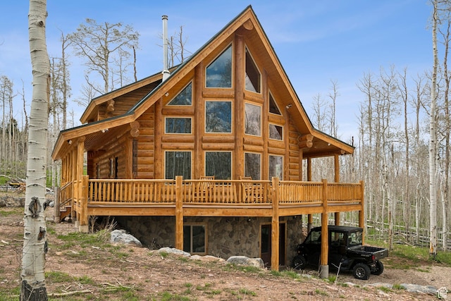 1085 Moose Hollow Rd, Robertson, WY 82944 - back of house featuring a deck and log siding