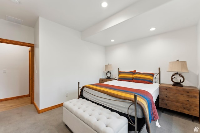 1085 Moose Hollow Rd, Robertson, WY 82944 - bedroom with light carpet, recessed lighting, and baseboards