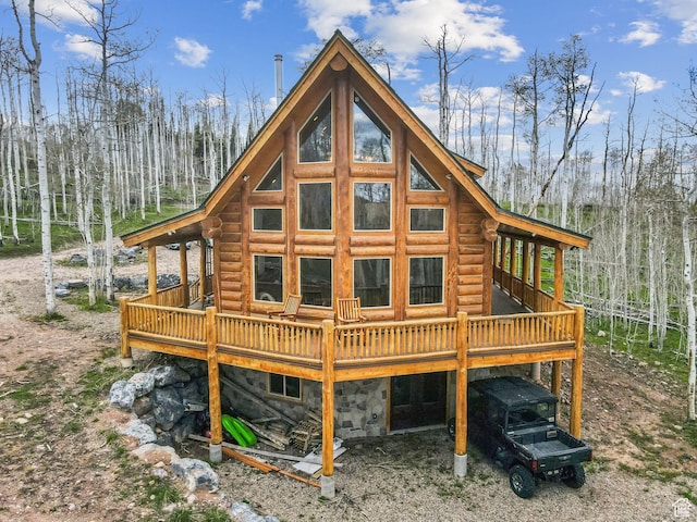 1085 Moose Hollow Rd, Robertson, WY 82944 - rear view of property featuring a deck and log exterior