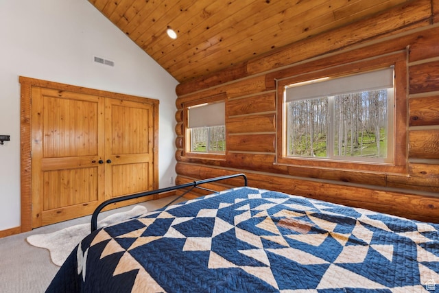 1085 Moose Hollow Rd, Robertson, WY 82944 - bedroom featuring rustic walls, multiple windows, wooden ceiling, carpet flooring, and high vaulted ceiling