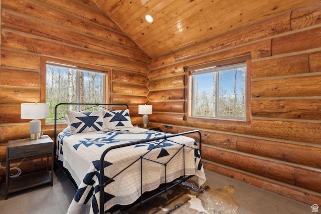 1085 Moose Hollow Rd, Robertson, WY 82944 - carpeted bedroom featuring lofted ceiling, multiple windows, and wood ceiling
