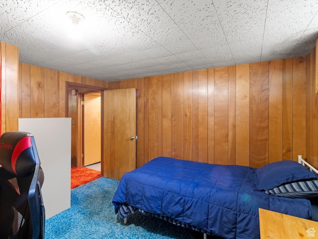 1026 N 500 E, Logan, UT 84341 - carpeted bedroom featuring wooden walls