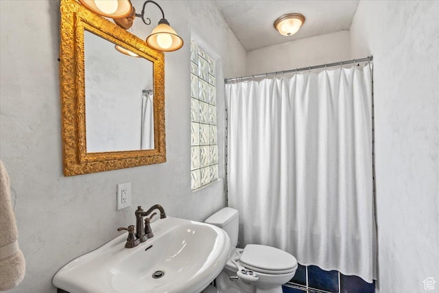 479 N Main St, Farmington, UT 84025 - bathroom with a sink, toilet, and a shower with shower curtain