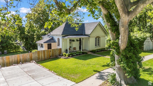 479 N Main St, Farmington, UT 84025 - view of front of home with stucco siding and covered porch