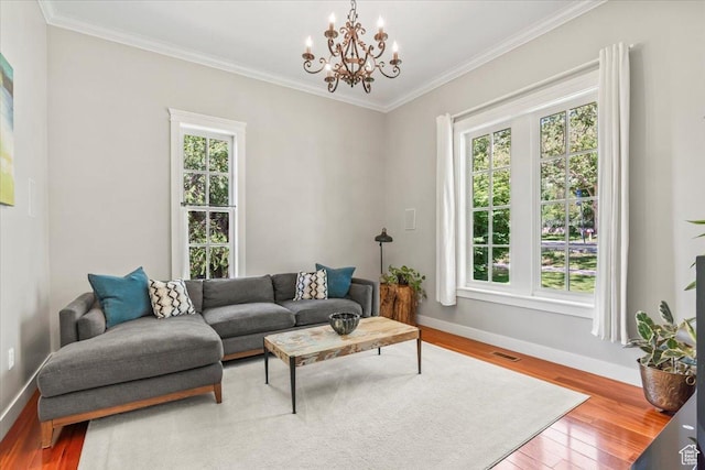 479 N Main St, Farmington, UT 84025 - living room with healthy amount of natural light, baseboards, a chandelier, and ornamental molding