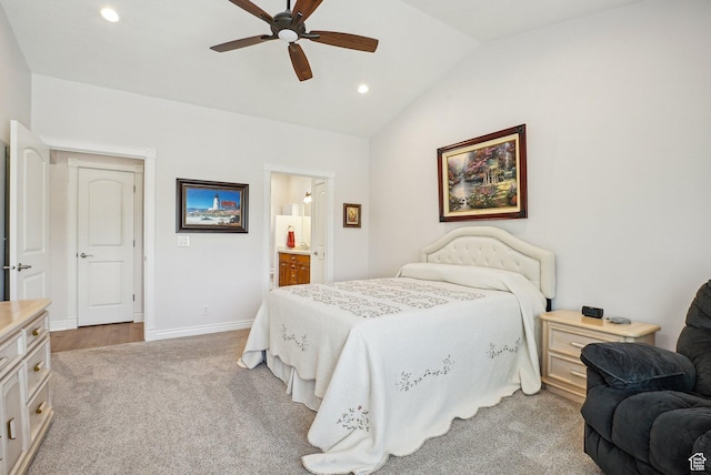9451 S Peaceful View Way S, Jordan, UT 84095 - bedroom with vaulted ceiling, light carpet, recessed lighting, baseboards, and ensuite bathroom