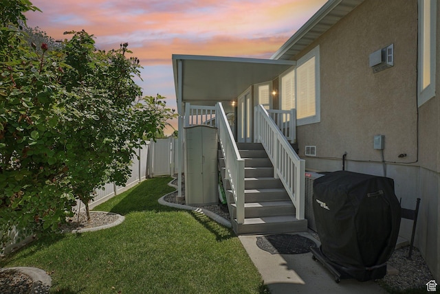 9451 S Peaceful View Way S, Jordan, UT 84095 - view of exterior entry with stucco siding and a wall unit AC