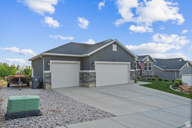 104 S 1250 E, Santaquin, UT 84655 - view of front of house with stone siding, an attached garage, stucco siding, and concrete driveway