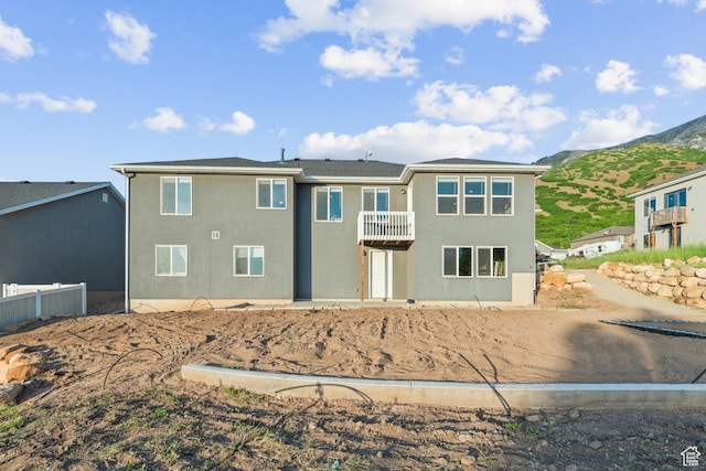 104 S 1250 E, Santaquin, UT 84655 - back of property featuring a balcony, stucco siding, and a mountain view