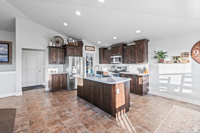 104 S 1250 E, Santaquin, UT 84655 - kitchen with stainless steel appliances, a sink, dark brown cabinets, lofted ceiling, and baseboards