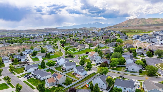 2384 N Nectar Way E, Saratoga Springs, UT 84045 - aerial view of property's location with nearby suburban area and a mountain backdrop