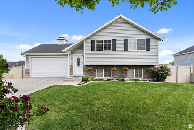 2384 N Nectar Way E, Saratoga Springs, UT 84045 - tri-level home with concrete driveway and a garage