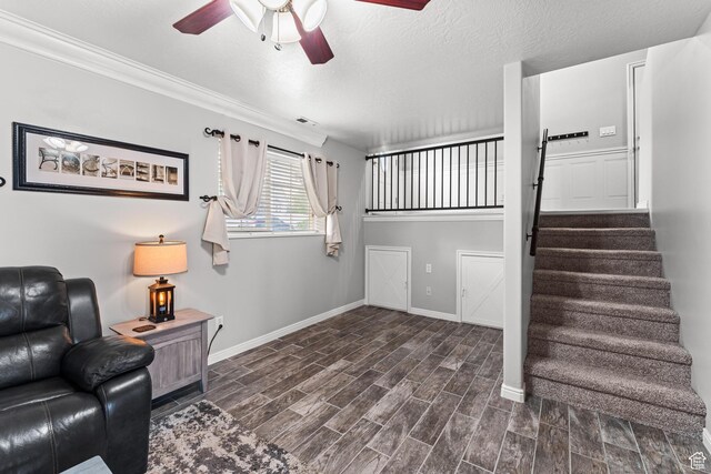 2384 N Nectar Way E, Saratoga Springs, UT 84045 - living area with a ceiling fan, baseboards, stairway, and dark wood-style flooring