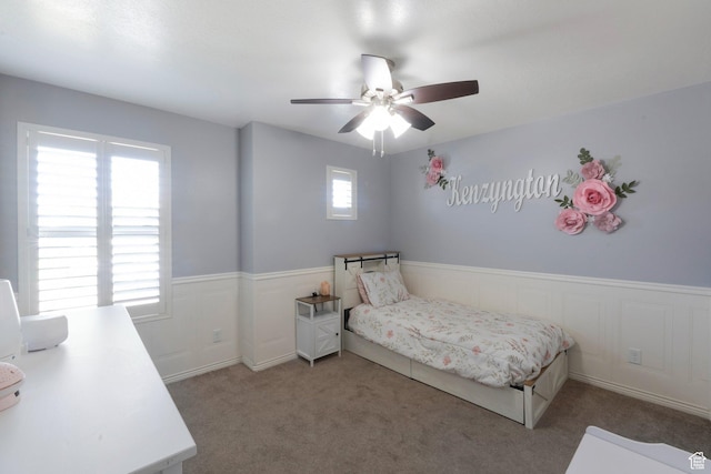 491 Travertine Way, Santaquin, UT 84655 - bedroom featuring carpet, wainscoting, and a ceiling fan