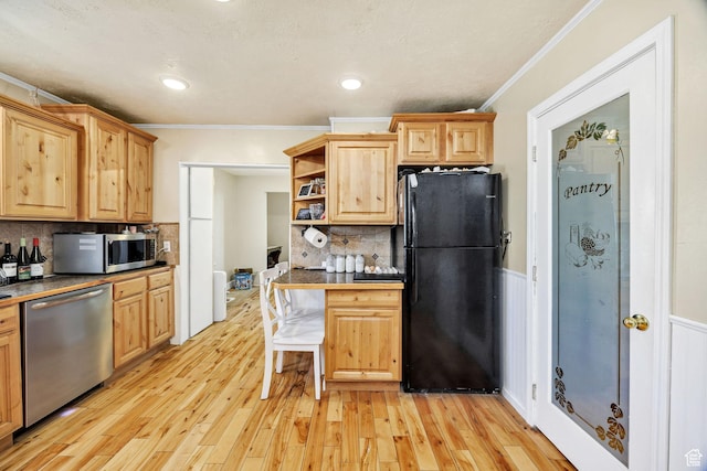 10205 W 10400 N, Tremonton, UT 84337 - kitchen featuring stainless steel appliances, open shelves, ornamental molding, light wood finished floors, and decorative backsplash
