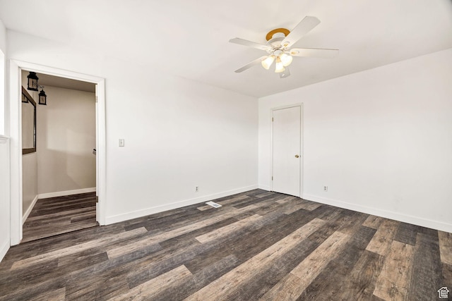10205 W 10400 N, Tremonton, UT 84337 - unfurnished room featuring dark wood finished floors, ceiling fan, and baseboards