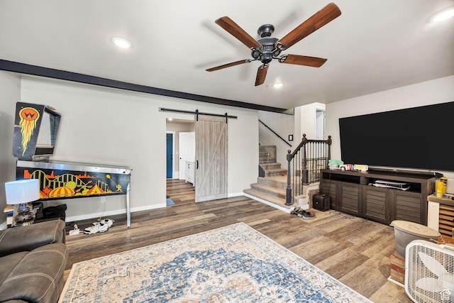 10205 W 10400 N, Tremonton, UT 84337 - living room with a barn door, a ceiling fan, wood finished floors, stairway, and recessed lighting