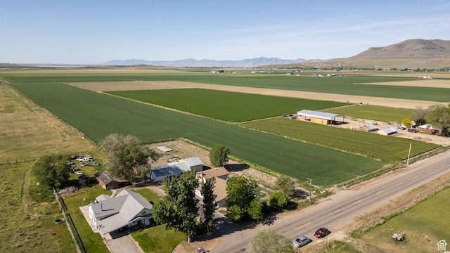 10205 W 10400 N, Tremonton, UT 84337 - aerial view of property and surrounding area featuring rural landscape, farmland, and a mountainous background