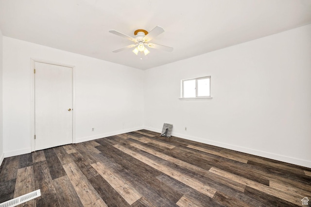 10205 W 10400 N, Tremonton, UT 84337 - unfurnished room featuring a ceiling fan, dark wood-style flooring, and baseboards