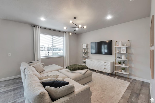 945 W Mckenna Rd, Bluffdale, UT 84065 - living area with a chandelier, wood finished floors, baseboards, and recessed lighting