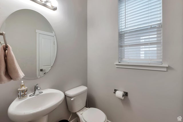 945 W Mckenna Rd, Bluffdale, UT 84065 - half bathroom with a sink and toilet