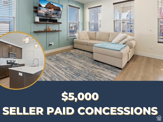 11764 S Leander Rd Unit 578, South Jordan, UT 84009 - living room with light wood-style flooring and baseboards