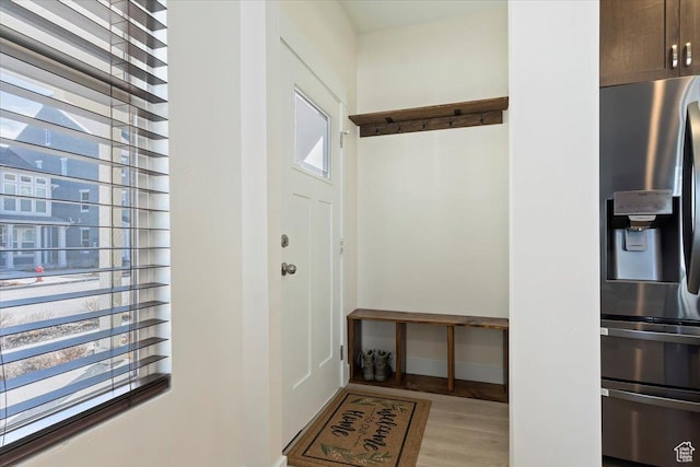 11764 S Leander Rd Unit 578, South Jordan, UT 84009 - mudroom featuring light wood-style floors and baseboards