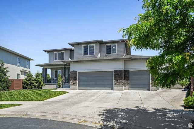 149 E 230 N, Vineyard, UT 84059 - view of front of property featuring concrete driveway and an attached garage