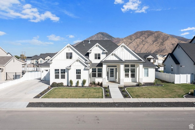 648 W 400 N, Mapleton, UT 84664 - modern inspired farmhouse featuring board and batten siding, a mountain view, a porch, and roof with shingles